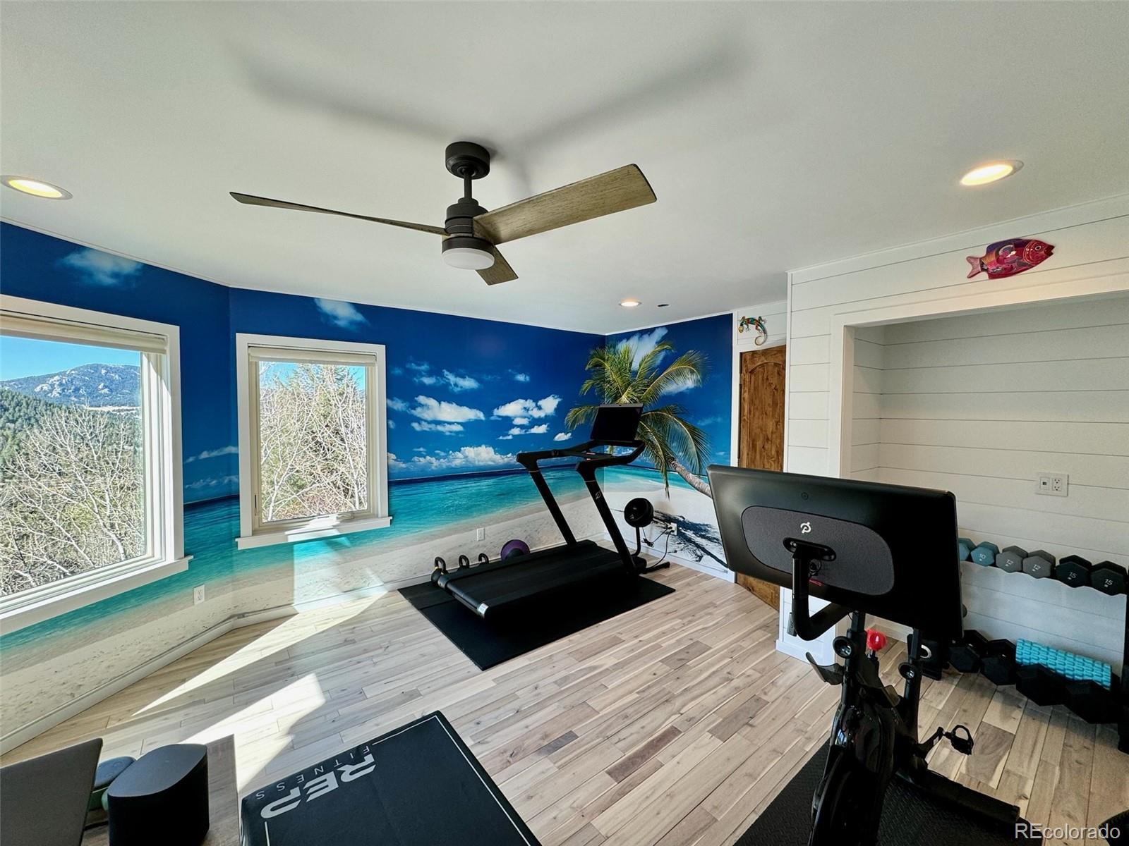 20670 Rangeview Drive Morrison, CO 80465 - Photo 10 of 39 a living room with furniture and wooden floor