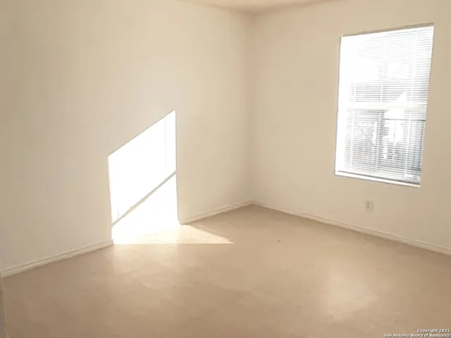 an empty room with a window