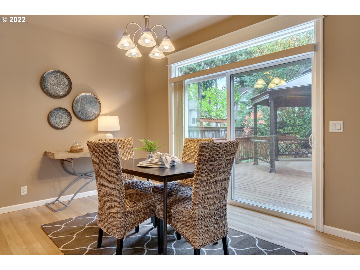 17496 Southwest 105th Avenue Tualatin, OR 97062 - Photo 14 of 28 a dining room with furniture and wooden floor