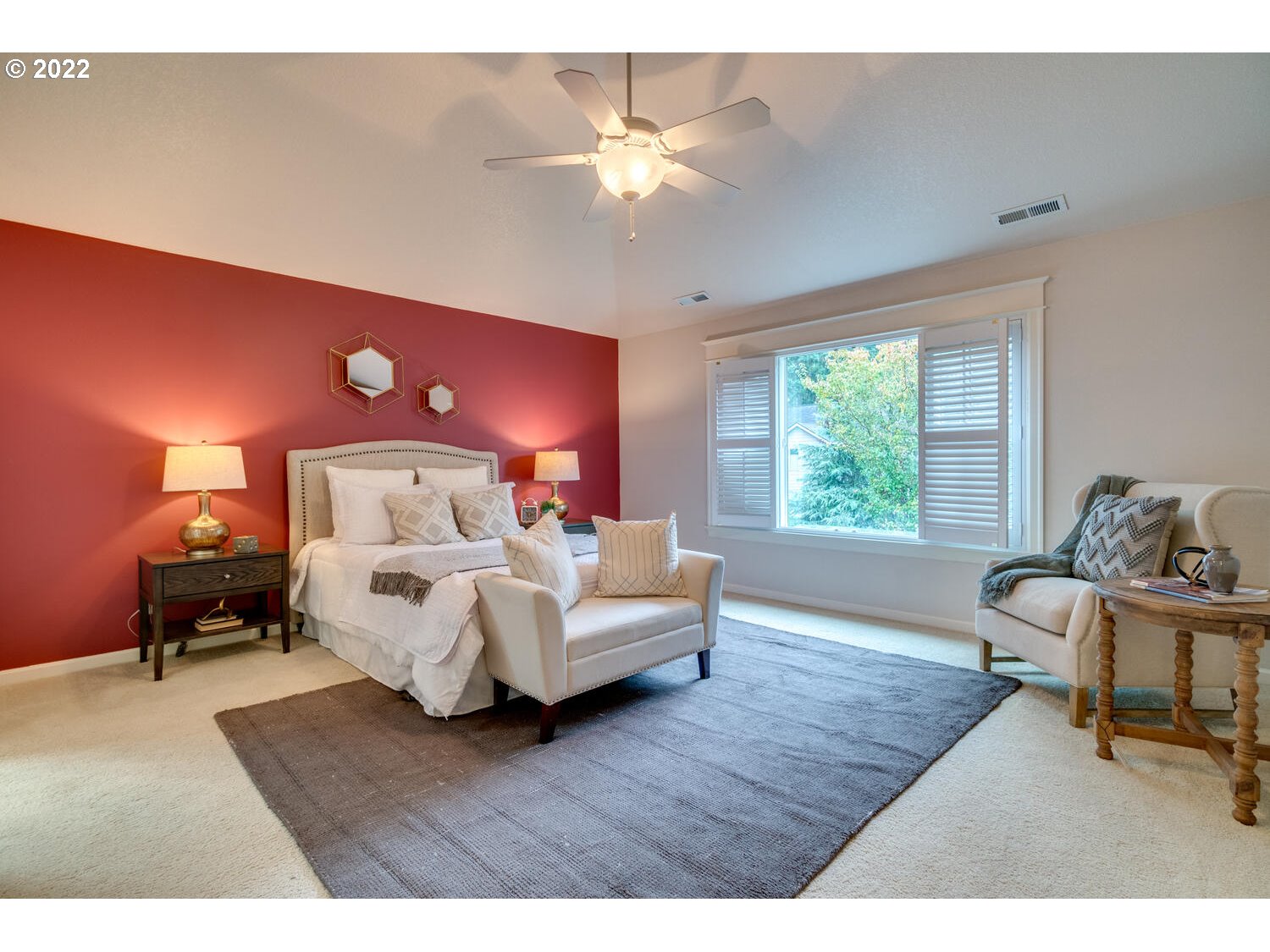 17496 Southwest 105th Avenue Tualatin, OR 97062 - Photo 17 of 28 a bed room with a bed and a chair
