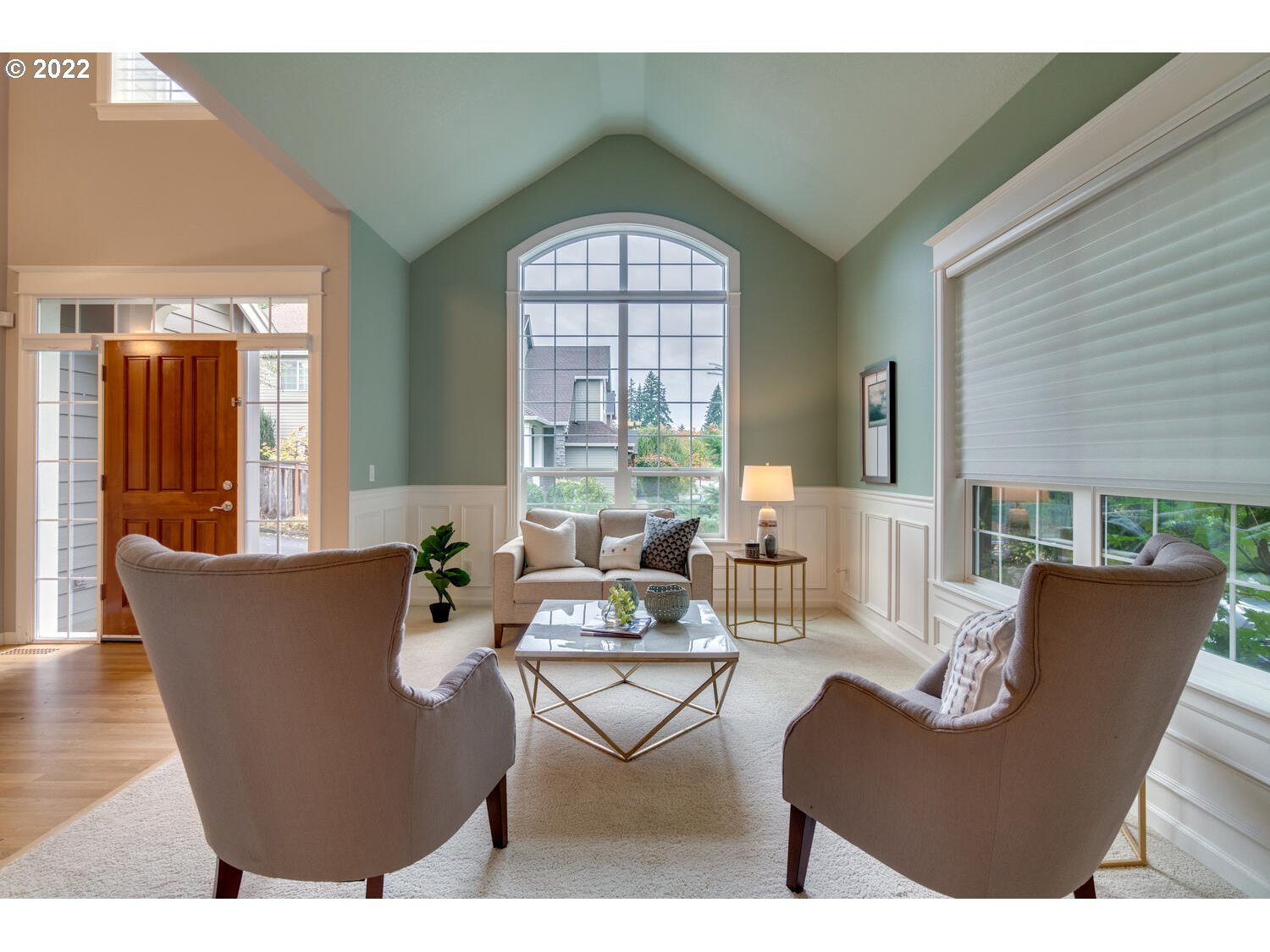 17496 Southwest 105th Avenue Tualatin, OR 97062 - Photo 2 of 28 a living room with furniture and a large window