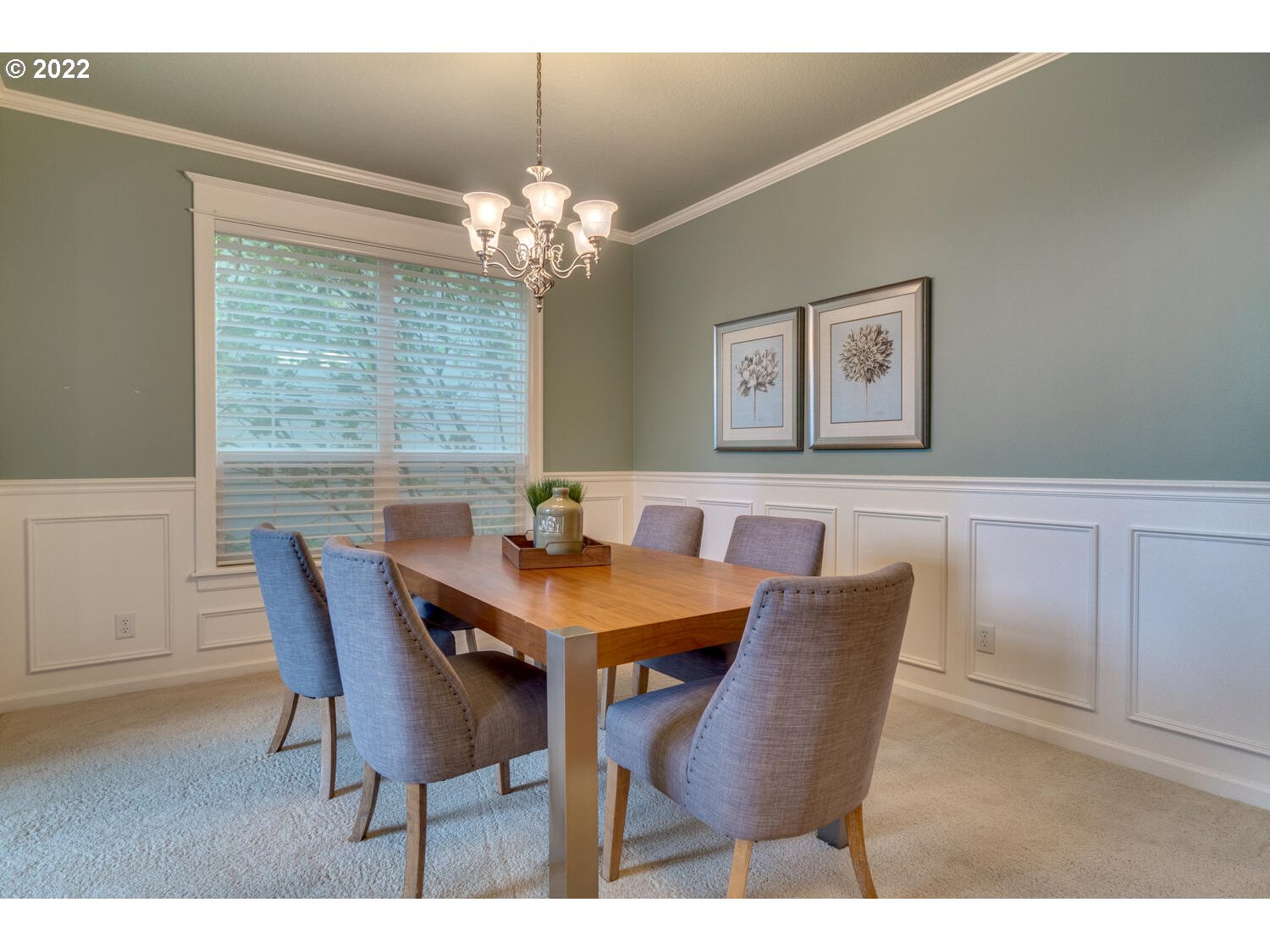 17496 Southwest 105th Avenue Tualatin, OR 97062 - Photo 5 of 28 a view of a dining room with furniture a chandelier and wooden floor