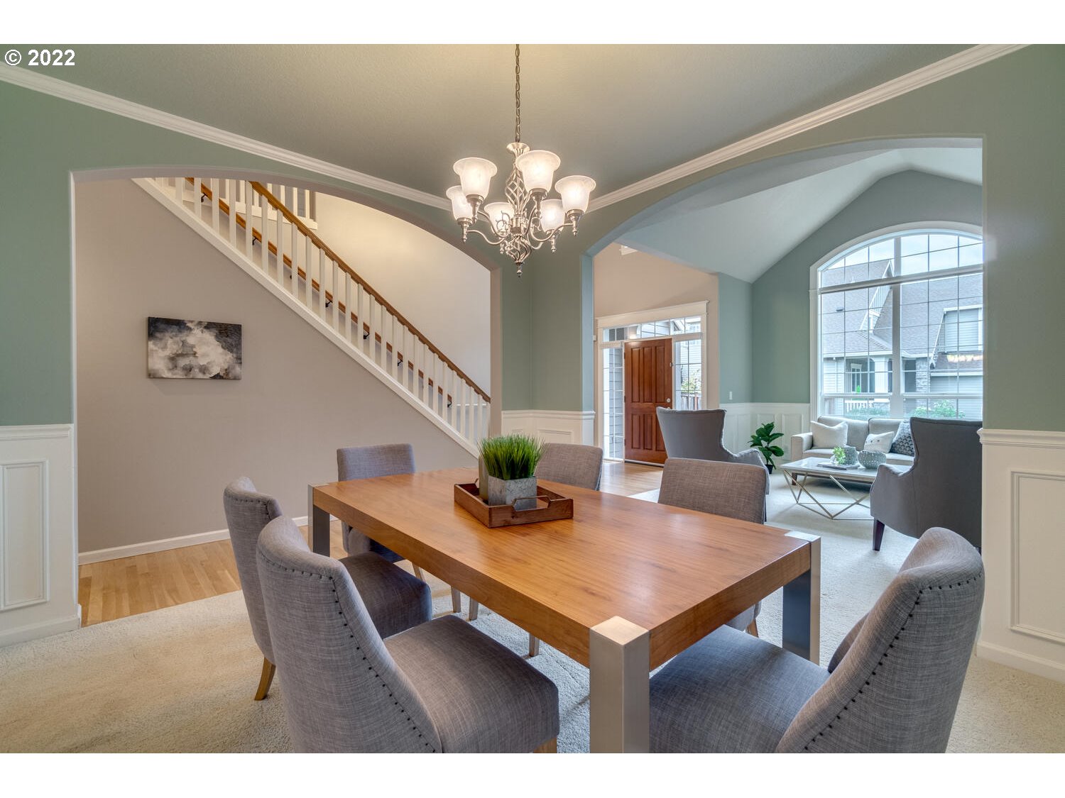 17496 Southwest 105th Avenue Tualatin, OR 97062 - Photo 6 of 28 a view of a dining room with furniture and a chandelier