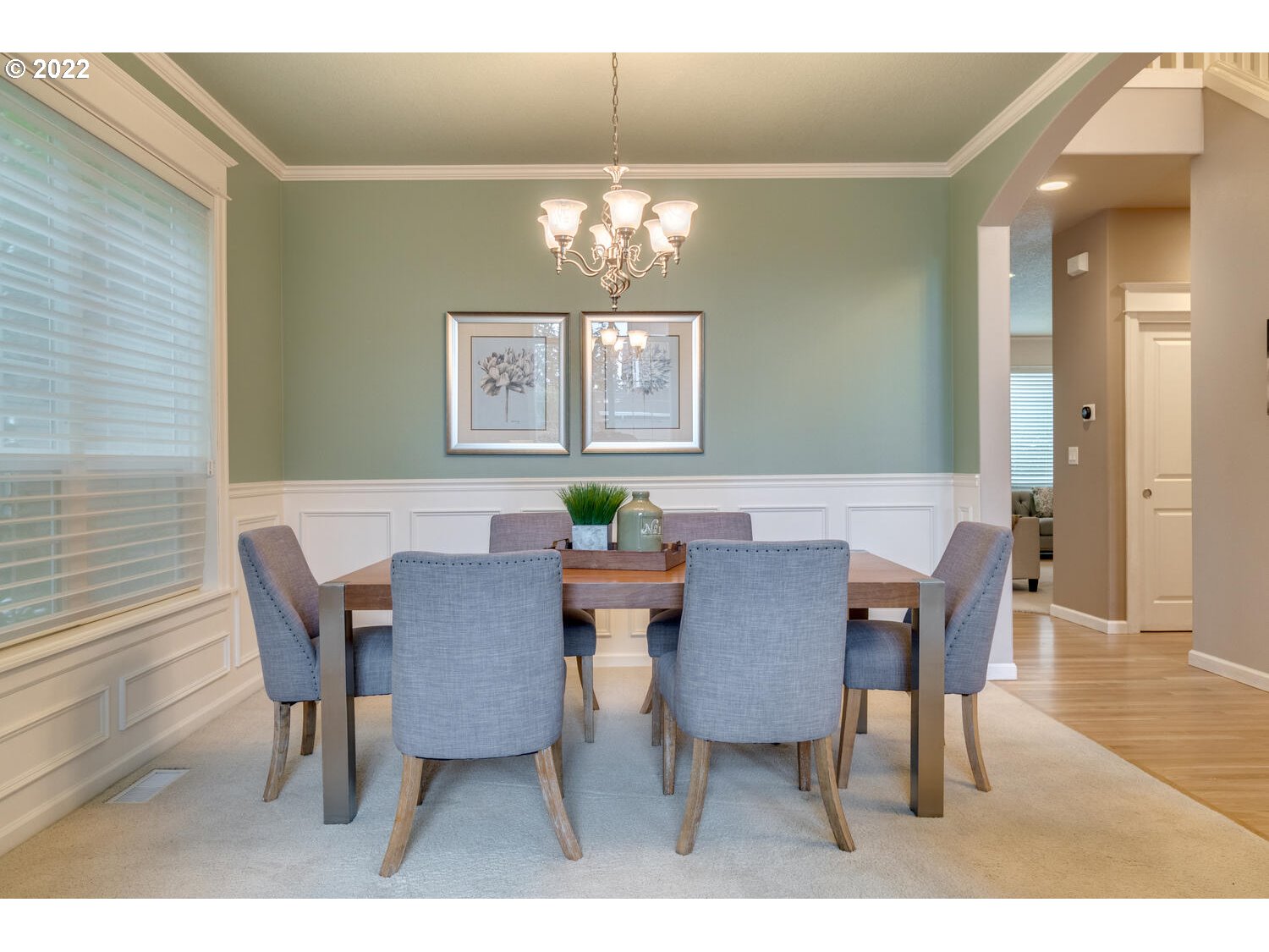 17496 Southwest 105th Avenue Tualatin, OR 97062 - Photo 7 of 28 a view of a dining room with furniture and chandelier