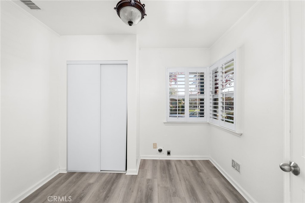 587 East Arrow Highway Upland, CA 91786 - Photo 12 of 17 an empty room with a window