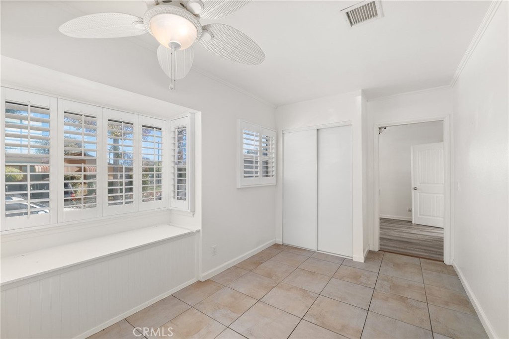 587 East Arrow Highway Upland, CA 91786 - Photo 14 of 17 a view of an empty room with a window