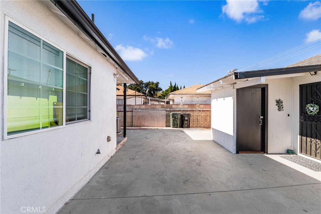 587 East Arrow Highway Upland, CA 91786 - Photo 16 of 17 a view of a house with backyard and parking