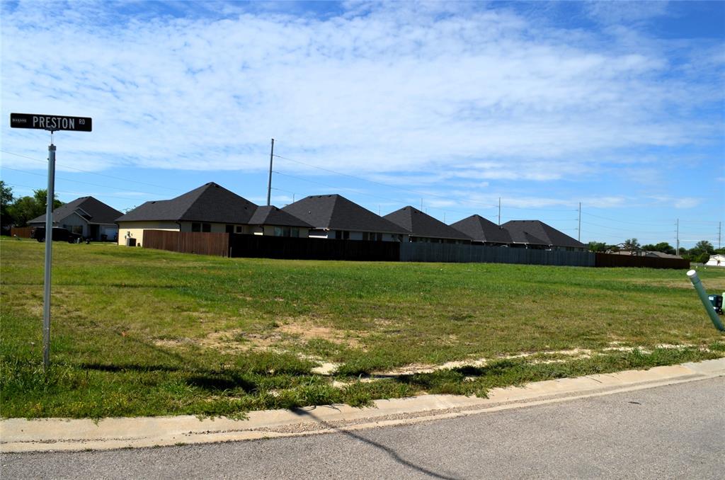 303 Preston Road Mabank, TX 75147 - Photo 2 of 5 a view of a lake with a big yard