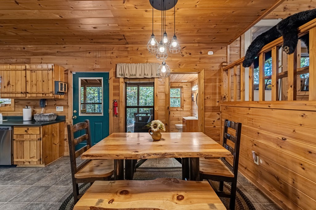 196 Ethan Wilson Way Morganton, GA 30560 - Photo 16 of 66 a dining room with a table and chairs