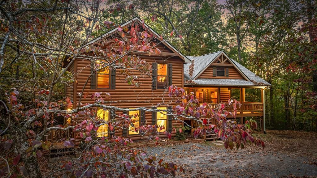 196 Ethan Wilson Way Morganton, GA 30560 - Photo 59 of 66 a front view of a house with garden