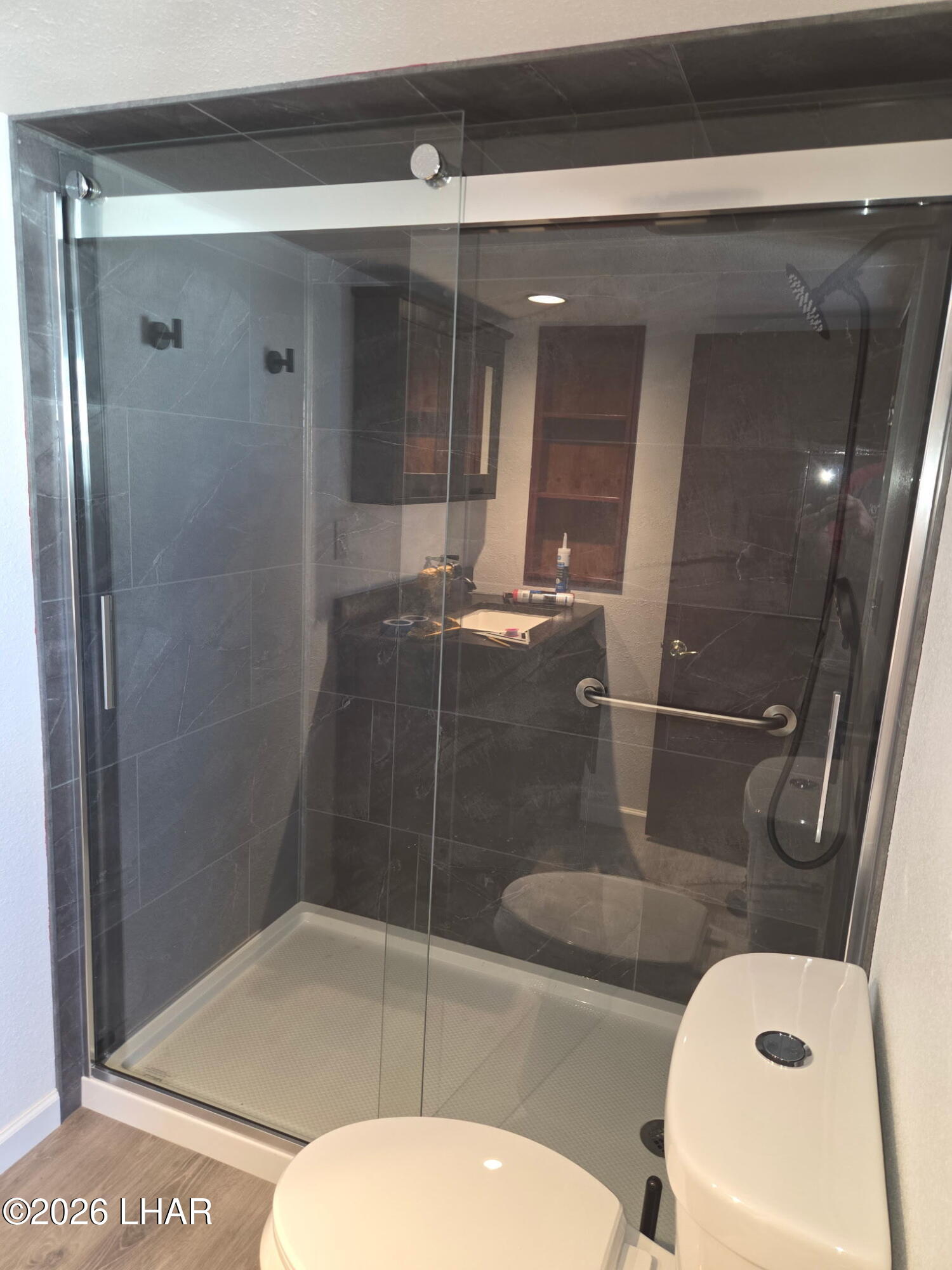 30 North Juniper Road Quartzsite, AZ 85346 - Photo 18 of 26 a bathroom with a toilet and a shower