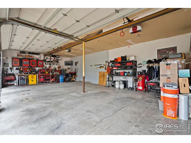a view of a garage with the bike and storage