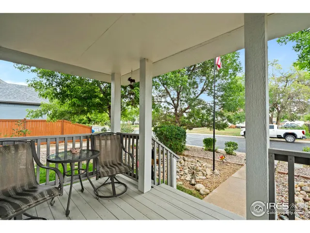 a view of a chairs and table in patio