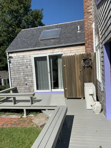 a view of a dinning tables and chairs in the patio