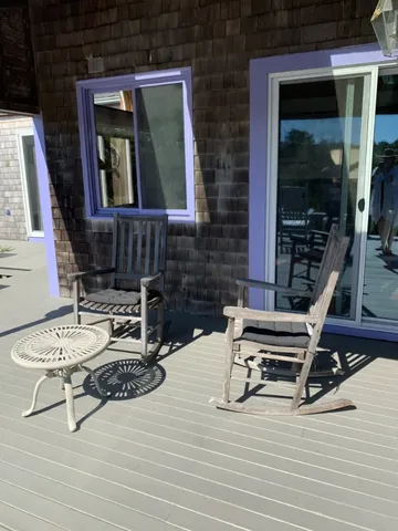 a view of a pool and an outdoor space