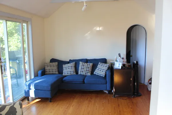 a kitchen with a refrigerator and a sink