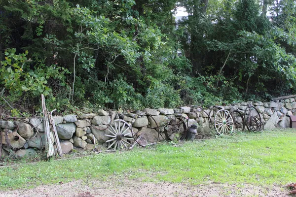 a kitchen with stainless steel appliances granite countertop a sink and a refrigerator