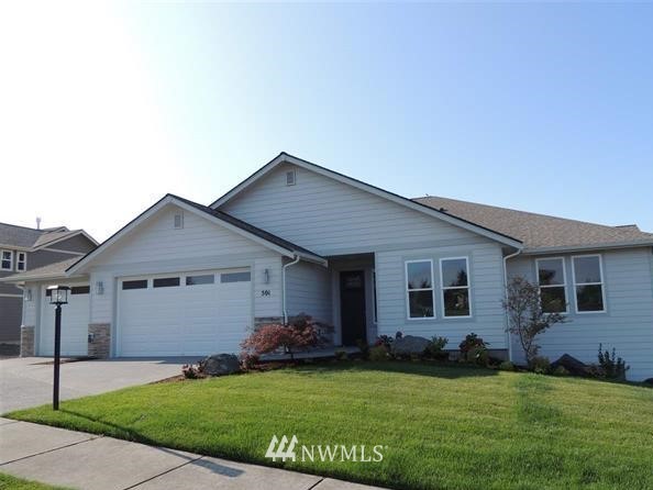 501 Morgison Loop Sequim, WA 98382 - Photo 1 of 1 a front view of a house with a garden