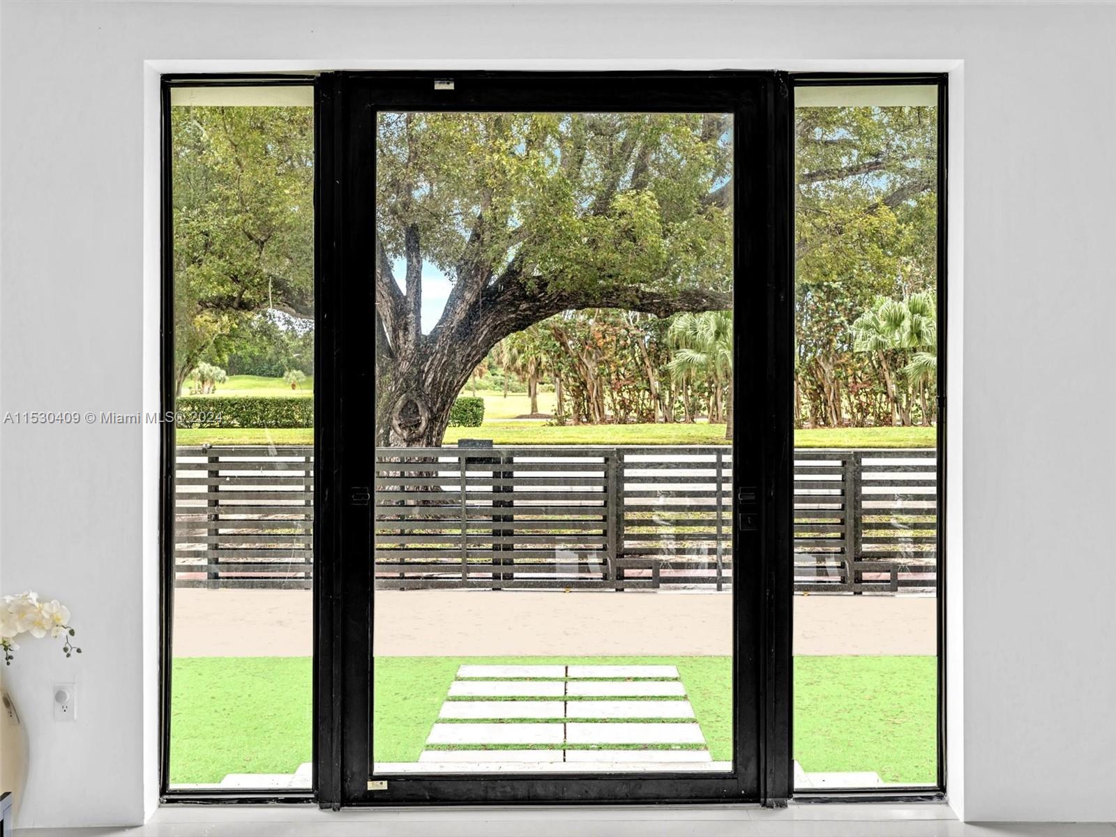 3010 Alton Road Miami Beach, FL 33140 - Photo 21 of 41 a view of a room that has a window in the back