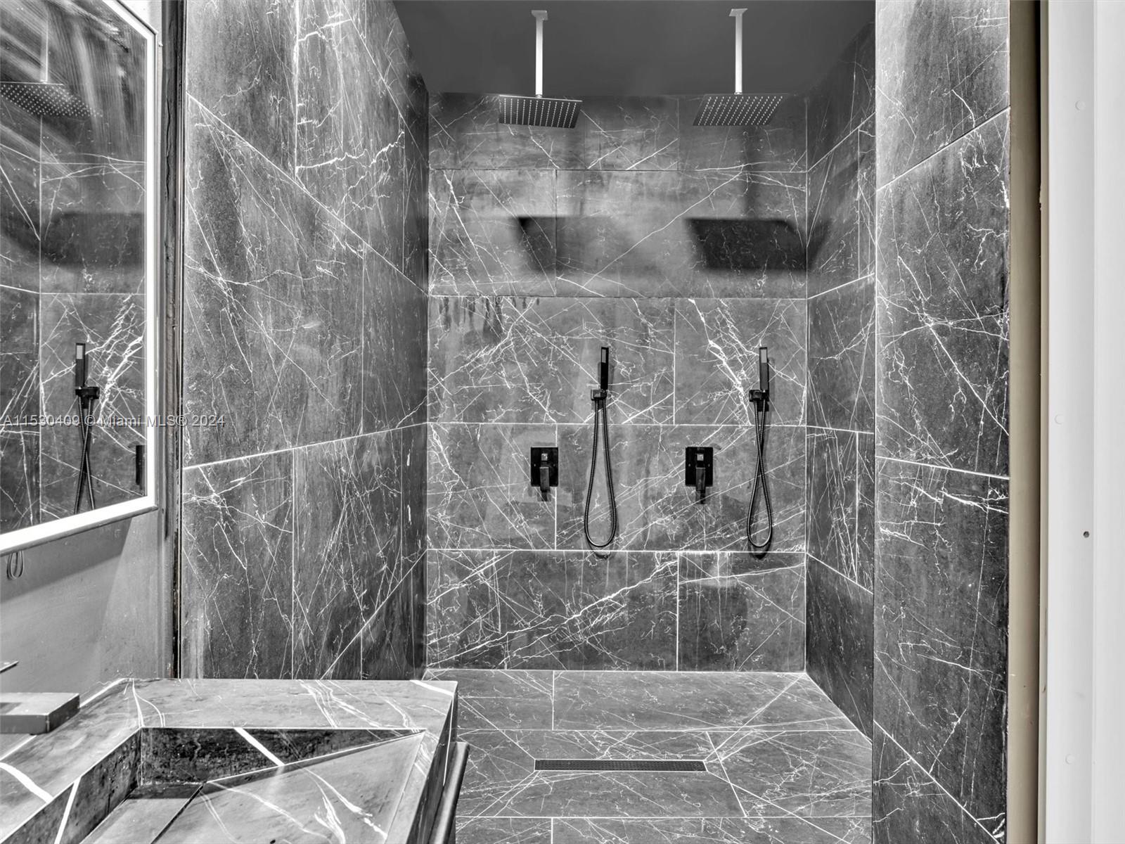 3010 Alton Road Miami Beach, FL 33140 - Photo 22 of 41 a bathroom with a shower