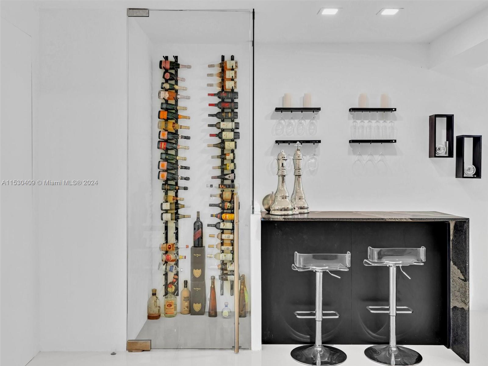 3010 Alton Road Miami Beach, FL 33140 - Photo 9 of 41 a room with a table and chairs