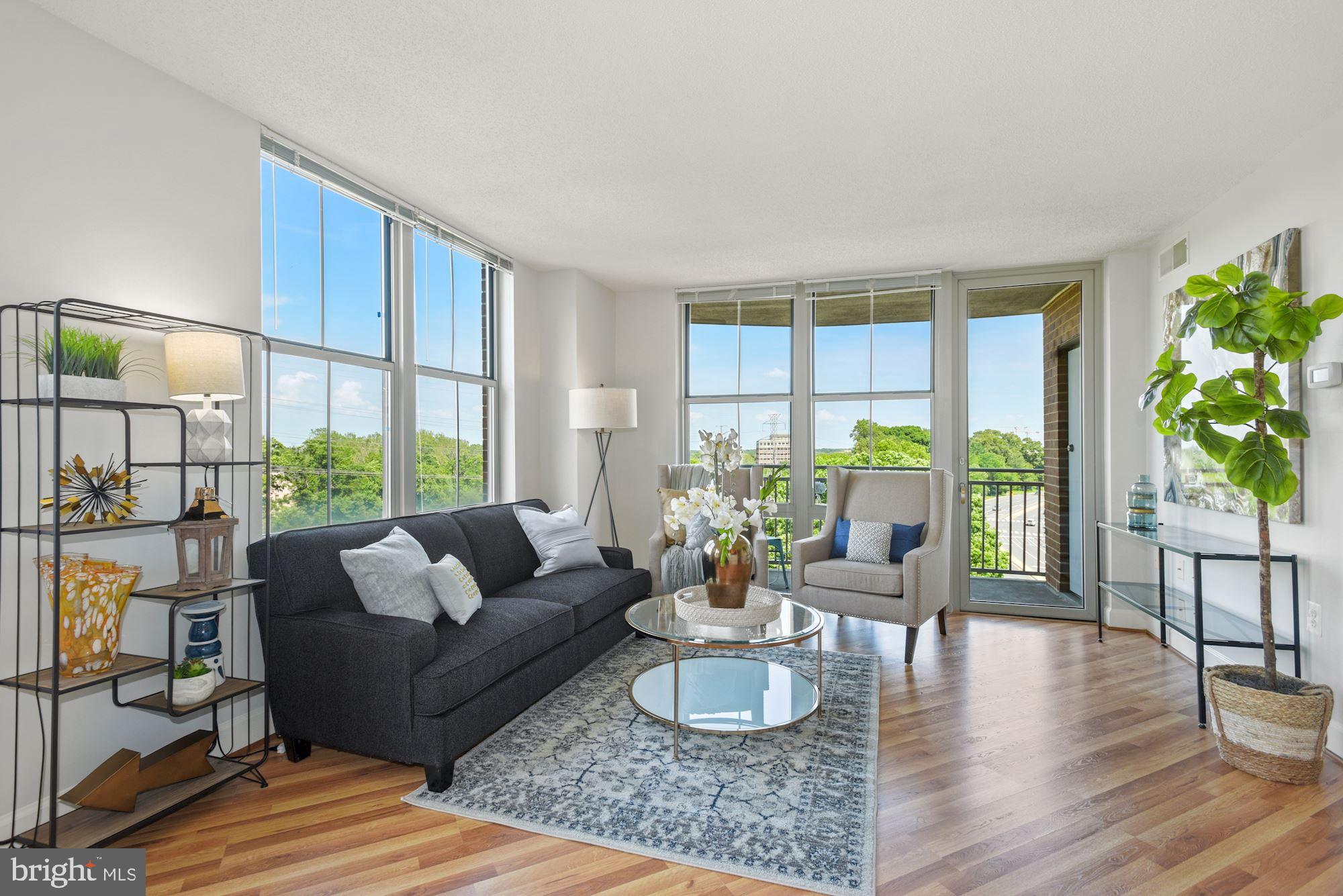 11800 Sunset Hills Road, Unit 622 Reston, VA 20190 - Photo 5 of 50 Living room with balcony