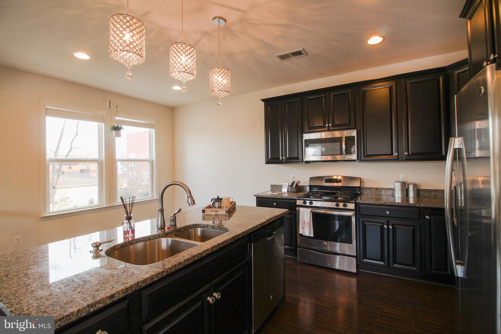 8919 Quarry Road Manassas, VA 20110 - Photo 11 of 21 Kitchen has TONS of cabinet space!