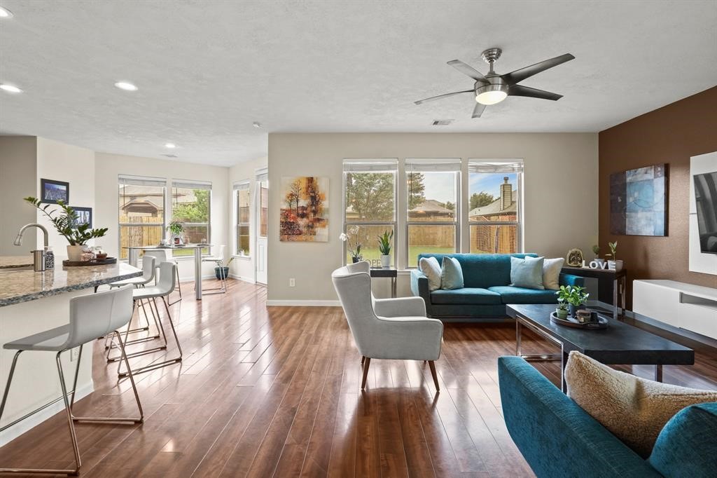6719 Path Way Court Katy, TX 77449 - Photo 9 of 35 a living room with furniture wooden floor and a window