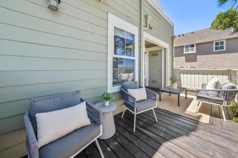 a view of a outdoor seating area with furniture