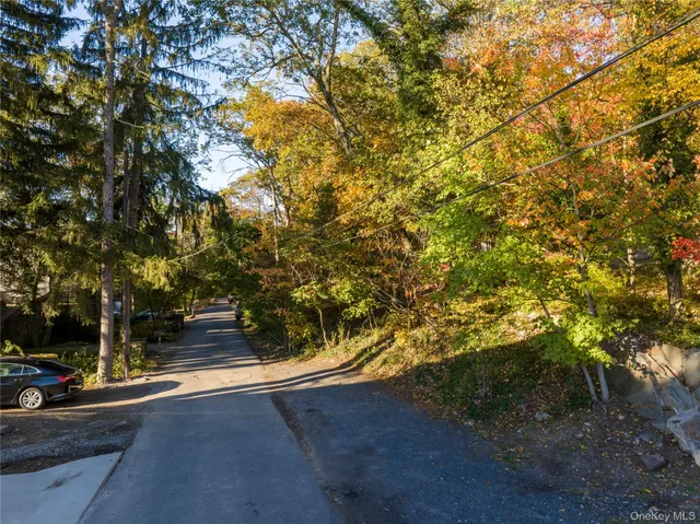 a view of road and trees