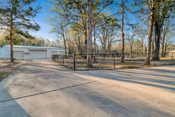 $779,000 | 390 Timber Lakes Drive, Powderly, TX 75473