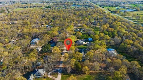 $779,000 | 390 Timber Lakes Drive, Powderly, TX 75473