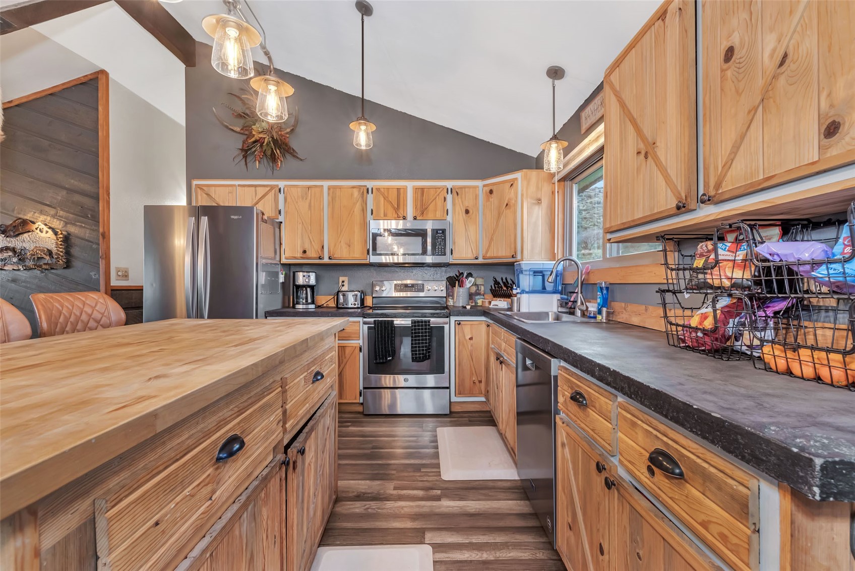 224 C R 206 Craig, CO 81625 - Photo 5 of 50 a kitchen with stainless steel appliances granite countertop a sink and cabinets