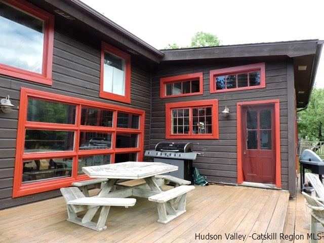 146 West Settlement Road Roxbury, NY 12474 - Photo 1 of 35 a view of backyard of house with outdoor seating