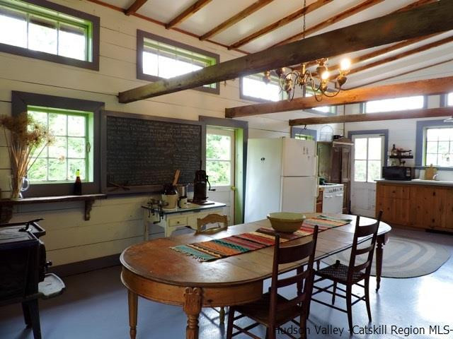 146 West Settlement Road Roxbury, NY 12474 - Photo 18 of 35 a view of a dining room with furniture and window