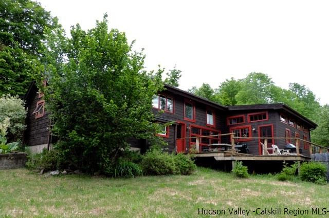 146 West Settlement Road Roxbury, NY 12474 - Photo 2 of 35 a view of a house with garden and trees