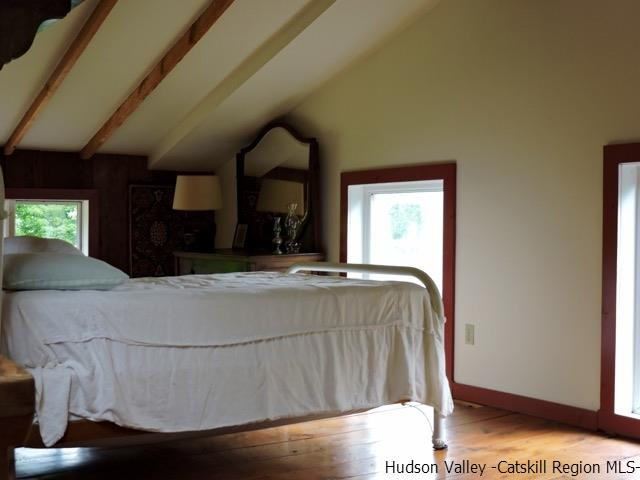 146 West Settlement Road Roxbury, NY 12474 - Photo 26 of 35 a living room with a bed furniture and a large window