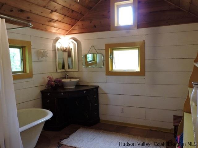 146 West Settlement Road Roxbury, NY 12474 - Photo 31 of 35 a bathroom with a toilet a sink and mirror