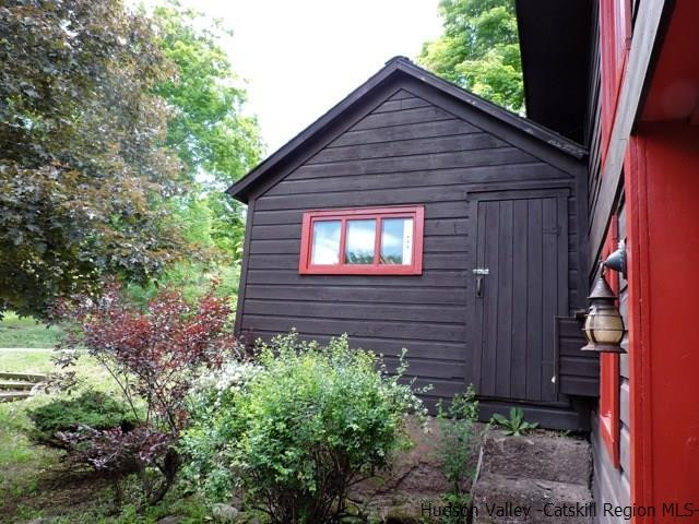 146 West Settlement Road Roxbury, NY 12474 - Photo 32 of 35 a view of a small house and garden