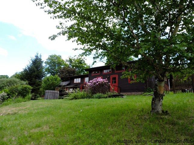 146 West Settlement Road Roxbury, NY 12474 - Photo 5 of 35 a view of a backyard with a garden