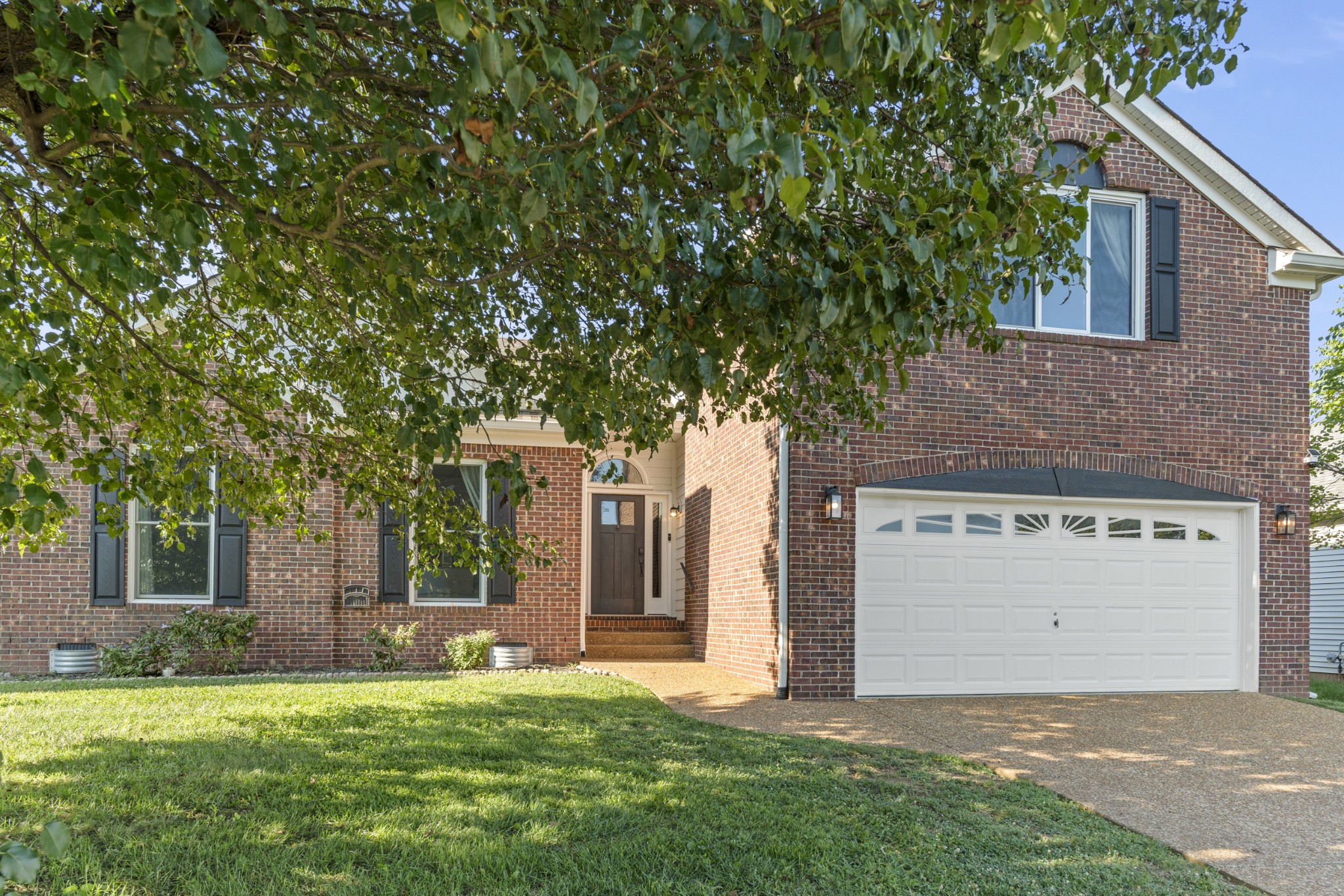 350 Astor Way Franklin, TN 37064 - Photo 2 of 33 front view of a house with a yard
