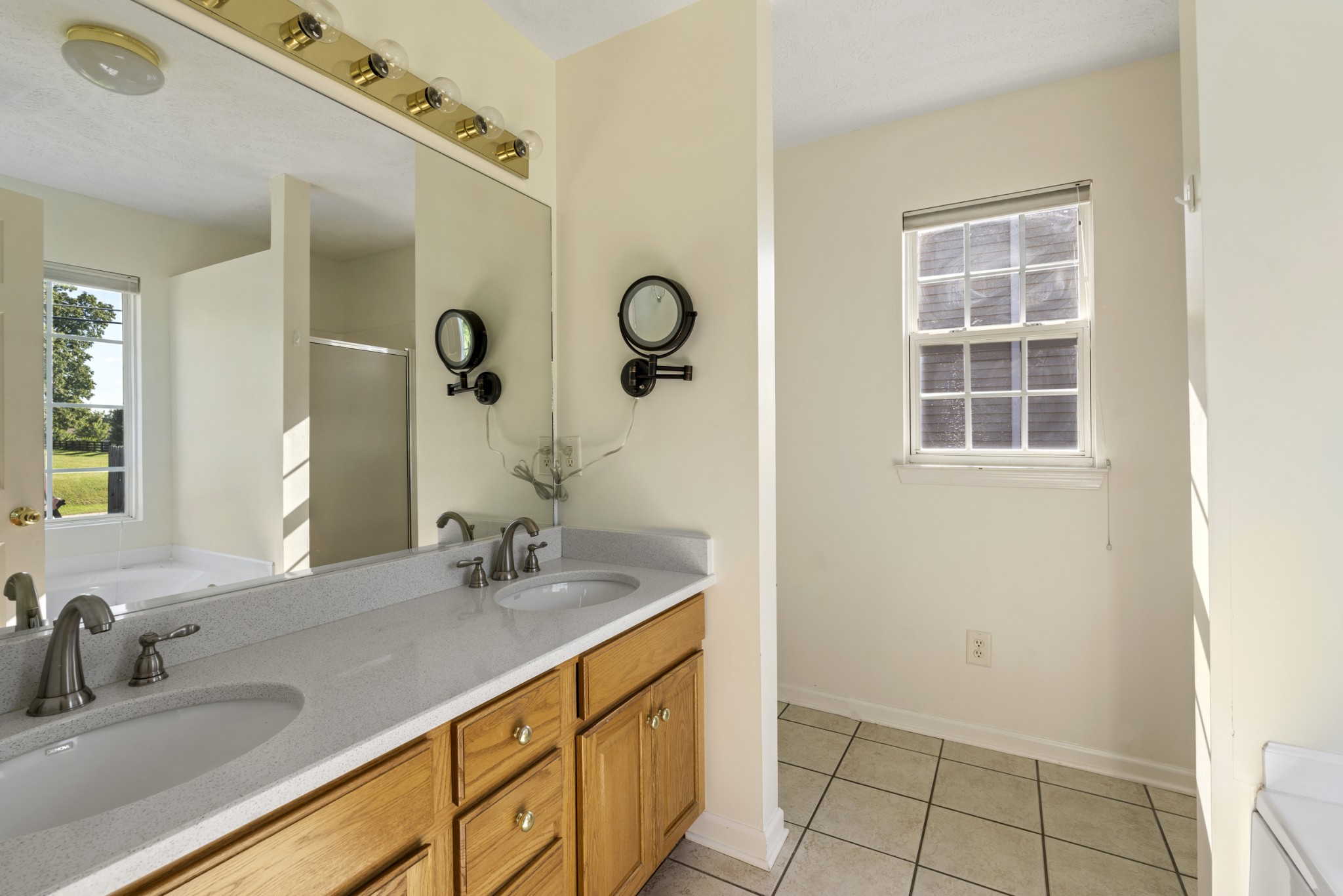 350 Astor Way Franklin, TN 37064 - Photo 21 of 33 a bathroom with a sink a vanity and a mirror