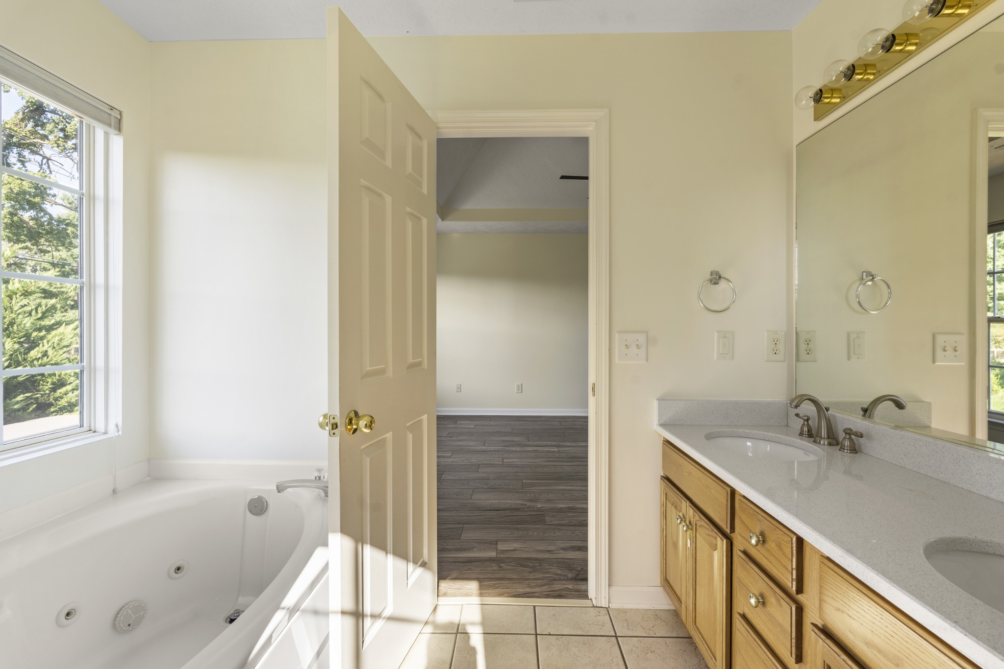 350 Astor Way Franklin, TN 37064 - Photo 22 of 33 a bathroom with a tub shower and sink