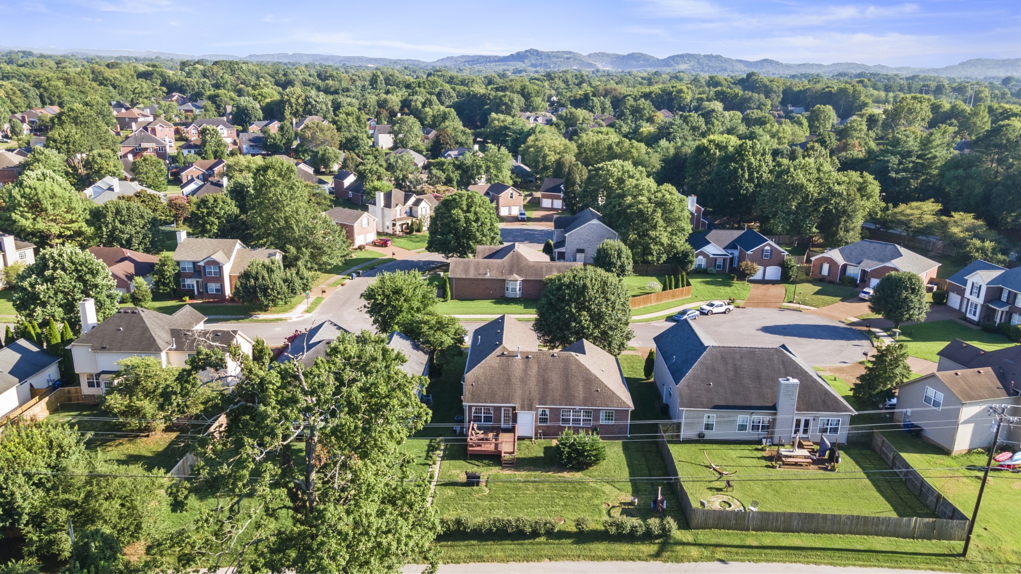 350 Astor Way Franklin, TN 37064 - Photo 32 of 33 an aerial view of multiple houses with yard