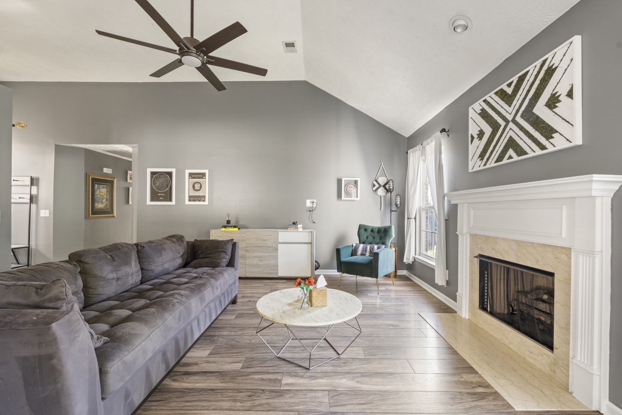 350 Astor Way Franklin, TN 37064 - Photo 6 of 33 a living room with furniture and a fireplace