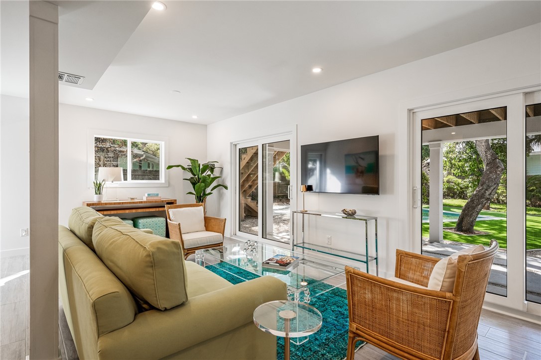1881 Pebble Path Vero Beach, FL 32963 - Photo 17 of 34 a living room with furniture flat screen tv and a large window