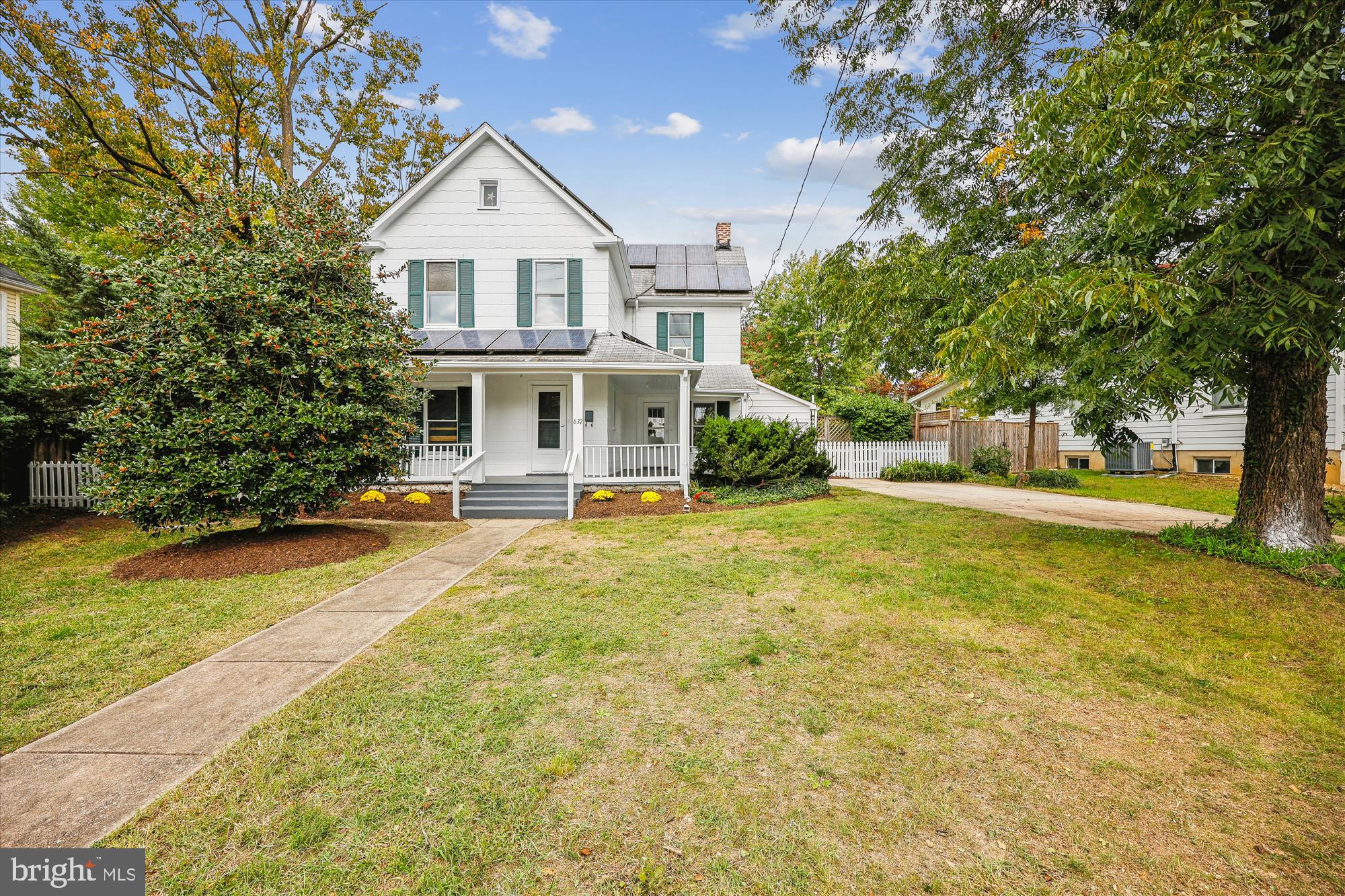637 Ritchie Avenue Silver Spring, MD 20910 - Photo 2 of 38 a front view of a house with a yard and trees