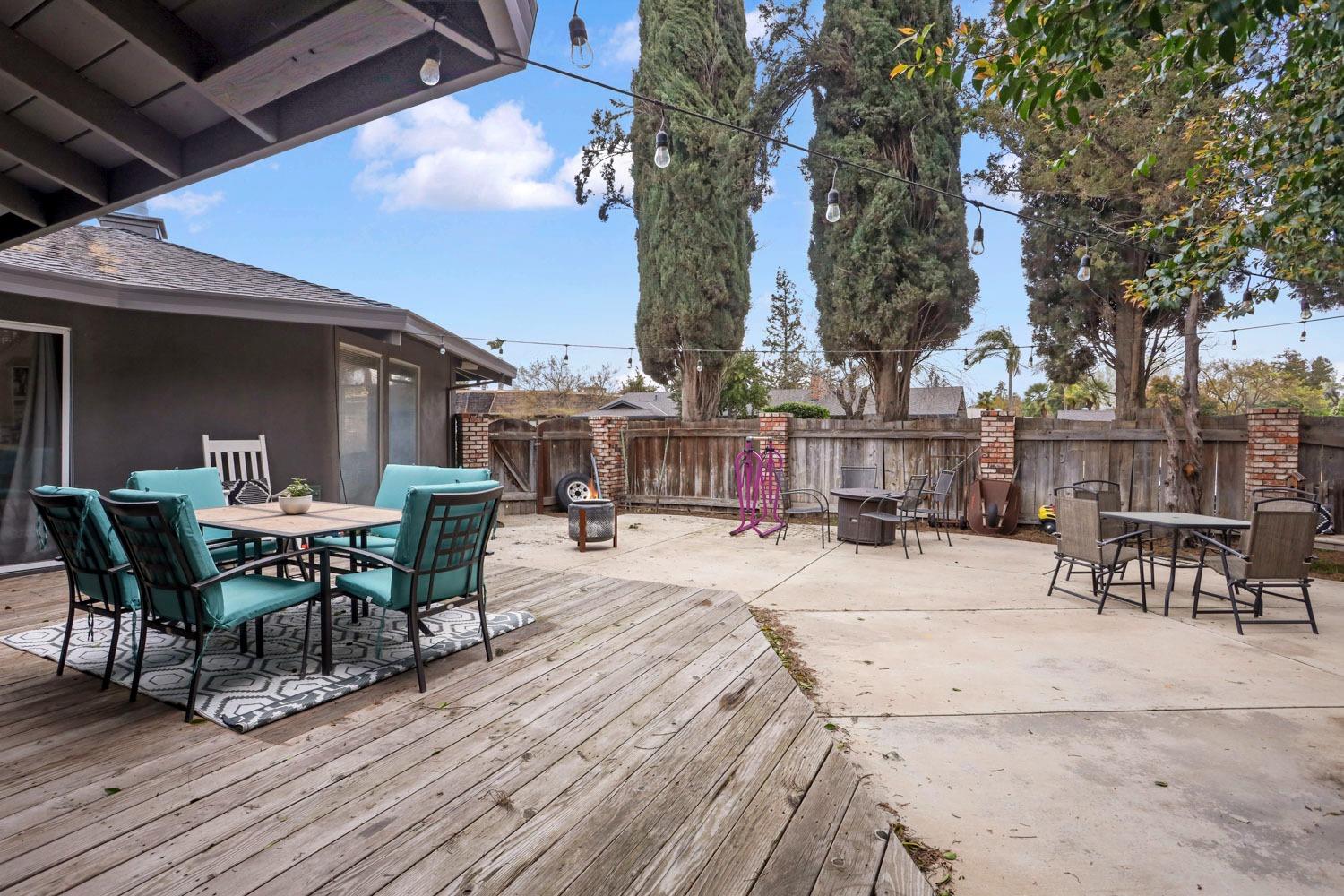 1631 North Johnson Road Turlock, CA 95382 - Photo 30 of 38 a view of a patio with a table and chairs