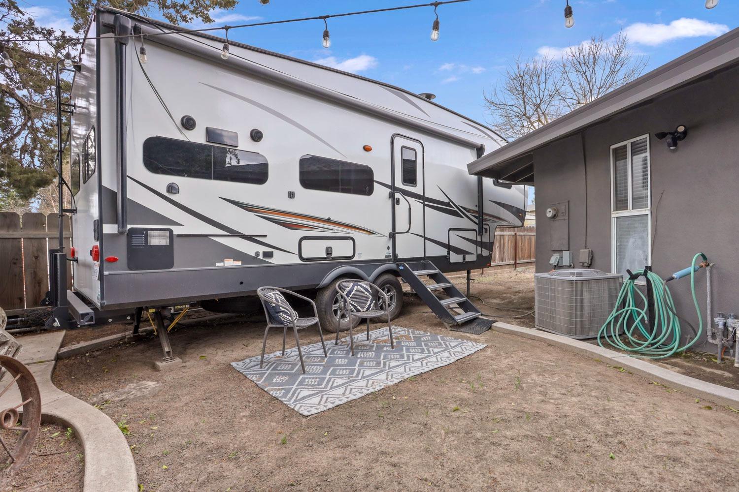1631 North Johnson Road Turlock, CA 95382 - Photo 35 of 38 a front view of a house with patio
