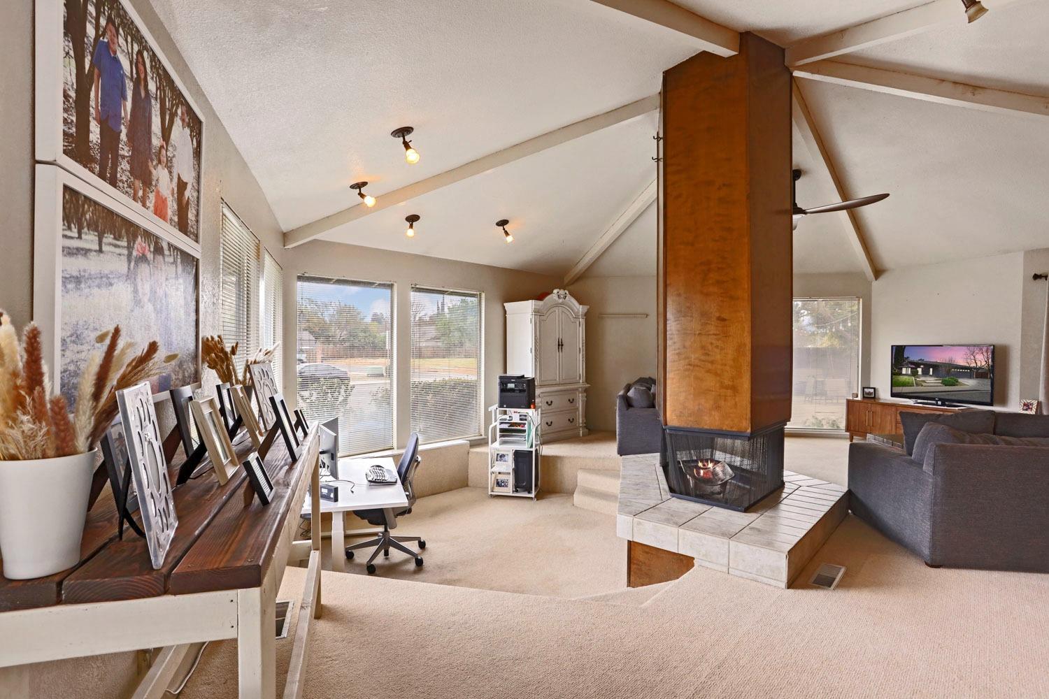1631 North Johnson Road Turlock, CA 95382 - Photo 6 of 38 a view of living room with furniture and floor to ceiling window